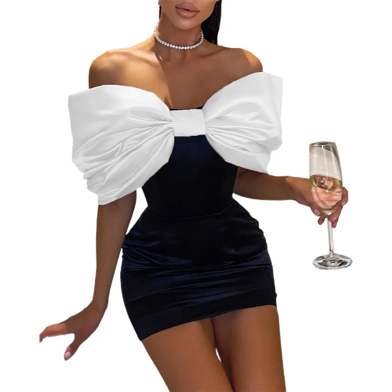 white bow dark blue skirt